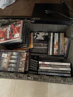 97 BRAND NEW SEALED DVDS & LG DVD PLAYER