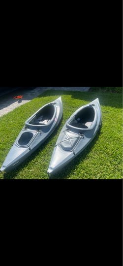 Twin fishing kayaks  paddles/vests included (2)