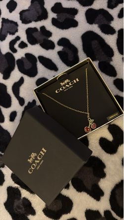 Coach cherry necklace