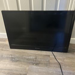Emerson 32in TV with brackets for wall mount, but no wall mount included