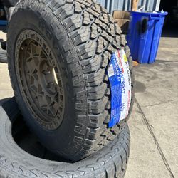 4 New 265/70/17 Atlander All Terrain  Tires 17” Gold Rims 
