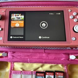 Nintendo Switch Lite Coral Color + Carrying Case + 4 Games + 256 GB memory 
