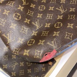 Louis Vuttion Bag And Clutch 