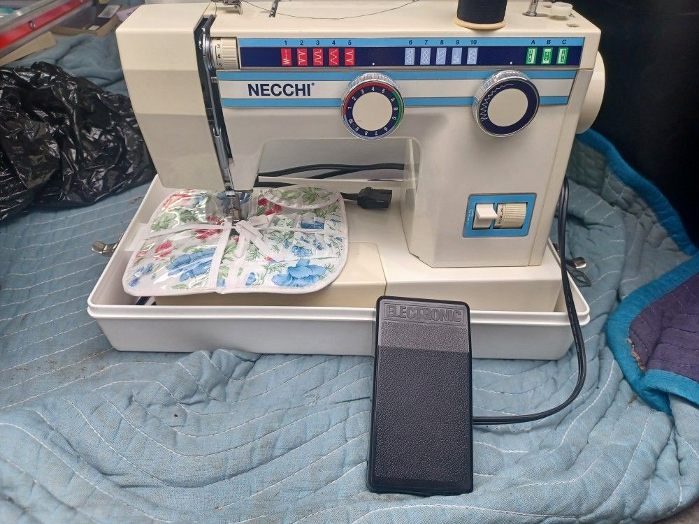Necchi Sewing Machine Model 3537 With Foot Pedal And Instruction Manual