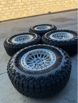 KMC rims 17x8.5 6 lugs 6x139.7 New 33 inch tires