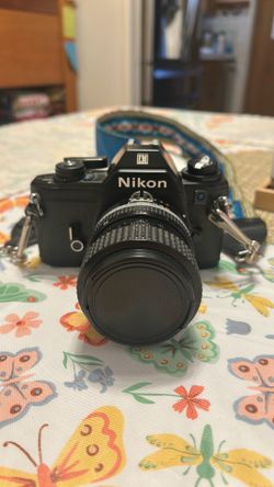 Nikon EM with 70 mm lens