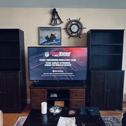 2 tall bookcases with cupboards/shelves