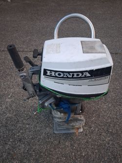 Honda 15hp 4cyl Outbord Boat  long Shaft Motor(no tank or hose good compression shifts. As is) no low ball offers please. Pick up fremont sea. No trad