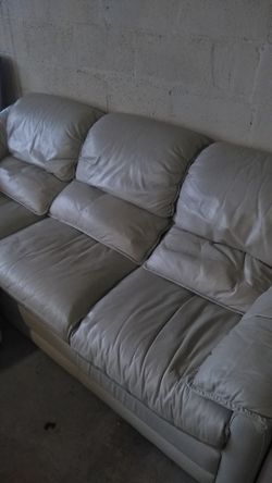 Cream sofa set with ottoman