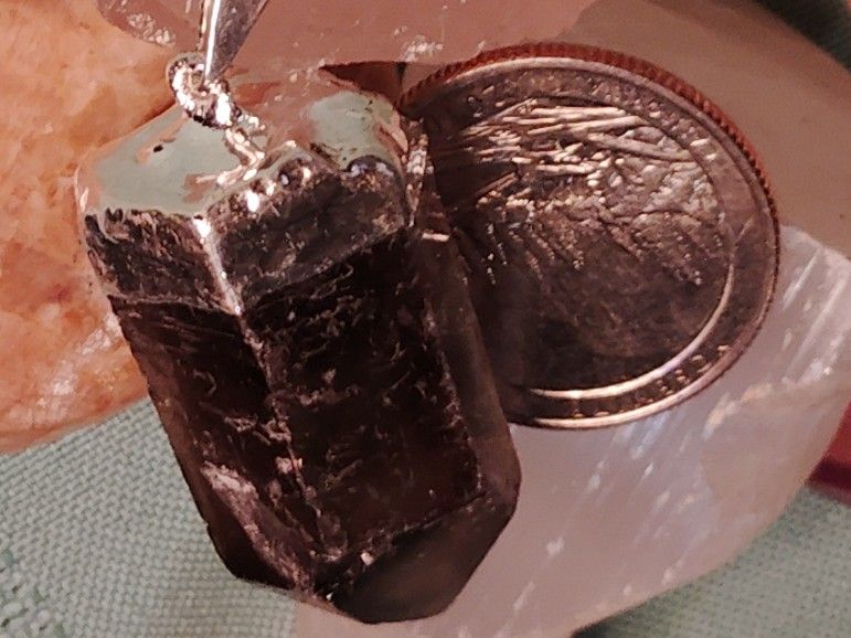 FREEFORM, FAT PIECE OF SMOKY QUARTZ. I AM ADDING TWO CHAINS ONE IN STERLING 20 INCH. THE OTHER IS 30 IN. NO CHARGE, EXTRA