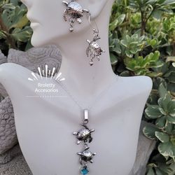Sterling Silver 925 Necklace and Earrings with a Turtle design and a blue topaz heart