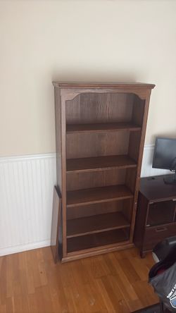 Tall Wooden Bookcase with 5 Shelves And a Excerise Bike