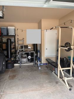 Weight equipment- steel weighted plates great condition, bench, adjustable dumbells, barbell, pull up and dip tower, weight rack
