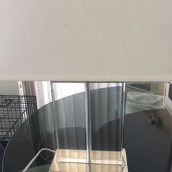 Glass table lamp with shade. From boutique In Westport . Never Used. Gorgeous Heavy Clear Base Glass. 