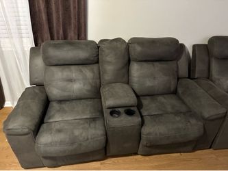 Dark grey reclining sofa