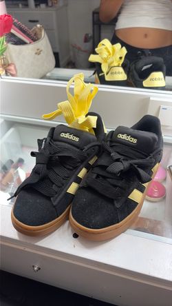 Yellow Adidas shoes
