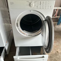LG front load washer and dryer with stand