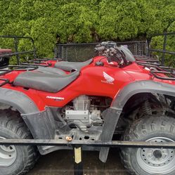 2  -  350 Honda Ranchers and trailer.  