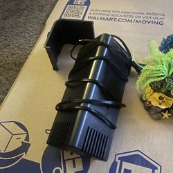 Aquarium Filter, GloFish coral decorations, TopFin water heater, Air Pump.