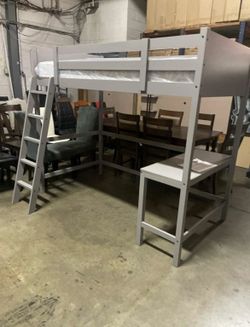 Twin loft bed with desk. Available in white & grey.Assembly required. Assembly not included. Tax included. Free local delivery.  $330 with out mattres