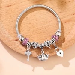 Pretty silver Bracelet  For the Princess Of Your Life. It Have A Lot Of Charms, 