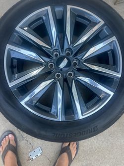 Cadillac Escalade Bridgestone Tire on Dark Alloy 22” Wheels