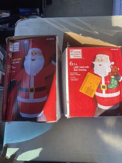 Inflatable Santas 9ft And 6 Ft Both New 