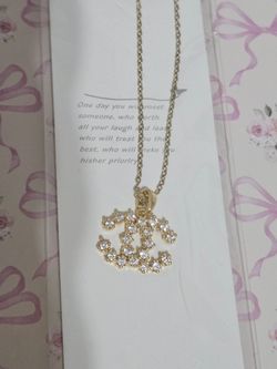 Designer-inspired CC necklace