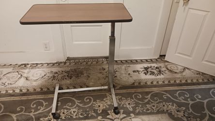Adjustable bed table for eating works great $10