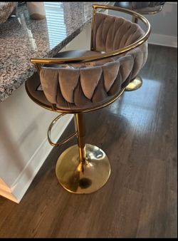 2 gold bar stools.