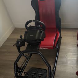Chair with Logitech wheel pedals and shifter 