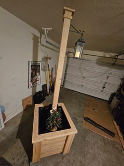 Custom Mobile raised beds, canopy and string light holder.