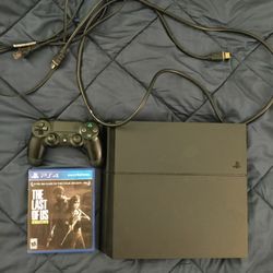 500gb PS4 with The last of Us game.