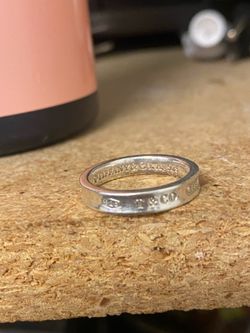 Tiffany & Co ring and heart/rose pendent