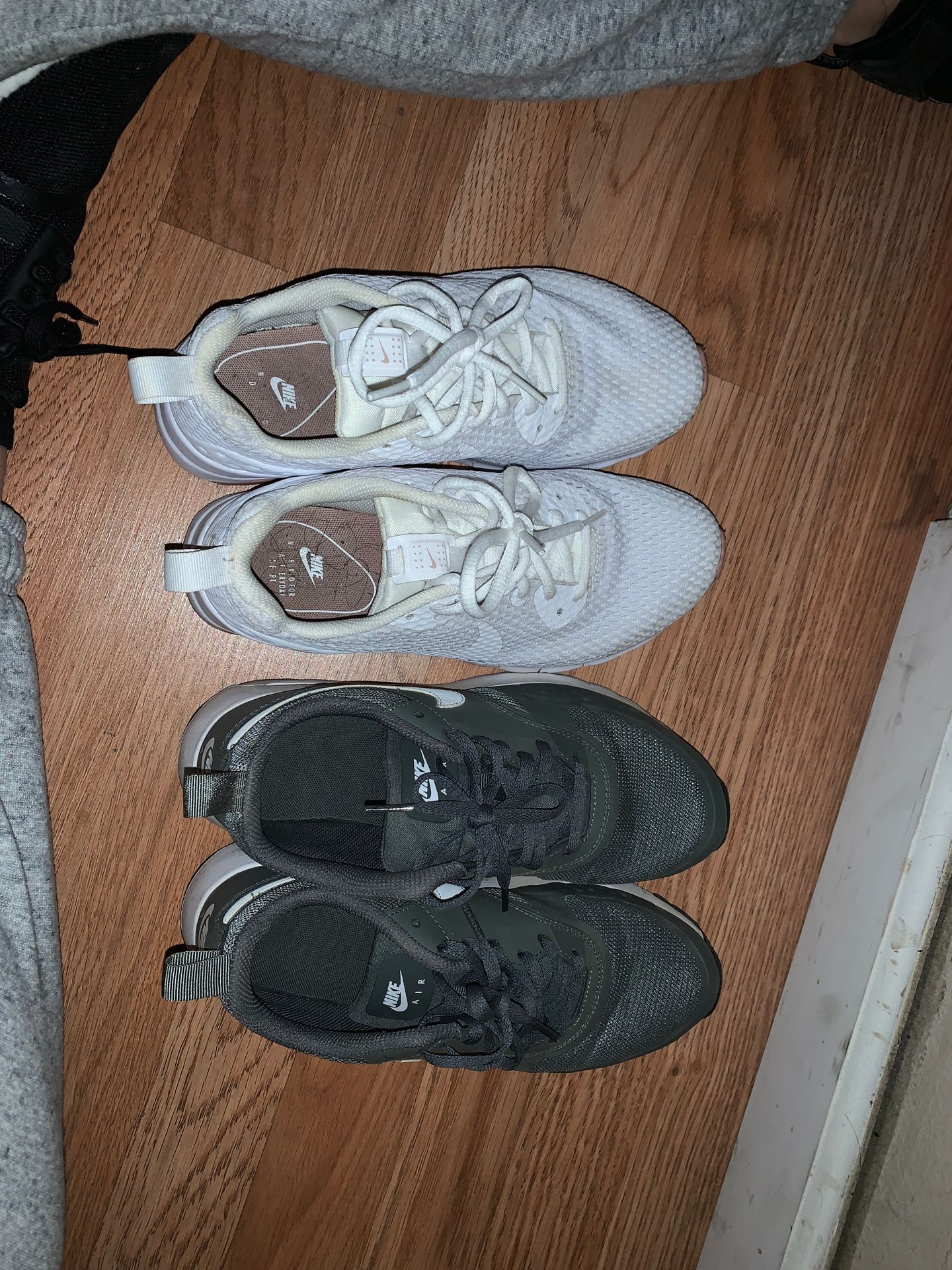 Nike shoes good condition white one are size 71/2 green are size 61/2 $40 each