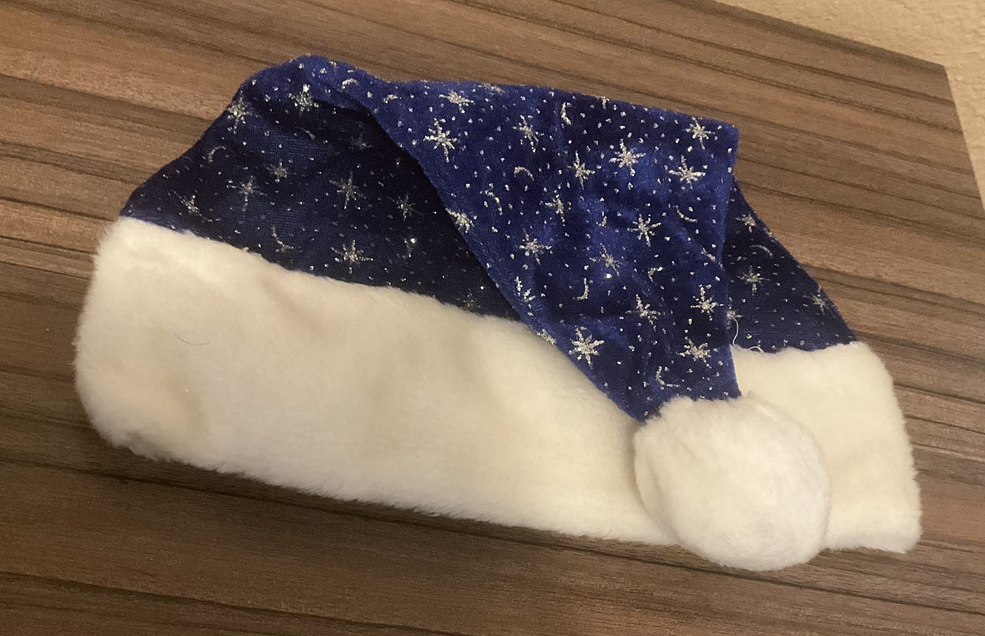 blue and silver santa hat