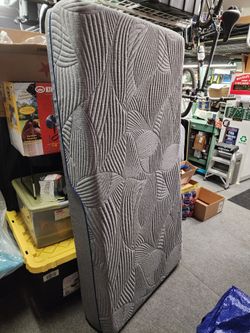 Twin bed and grey metal frame