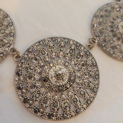 Silver tone medallion necklace and bracelet set