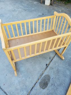 Rocking baby crib. Fair condtion.