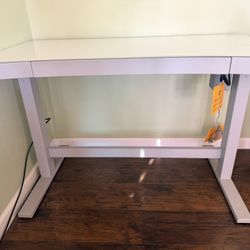 White Glass Top Desk With A Leather Chair 