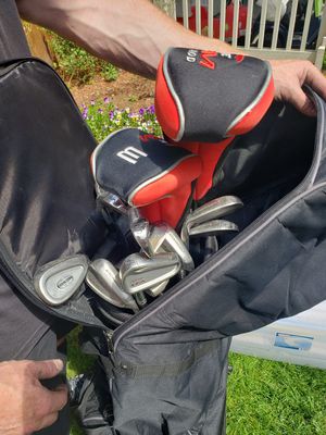Photo Custom golf clubs and travel bag