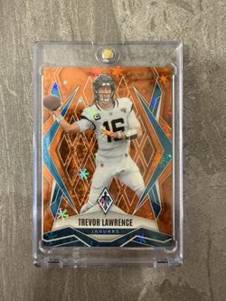2025 Panini Phoenix Trevor Lawrence Orange Winter Snowflake #/99 SP Jags