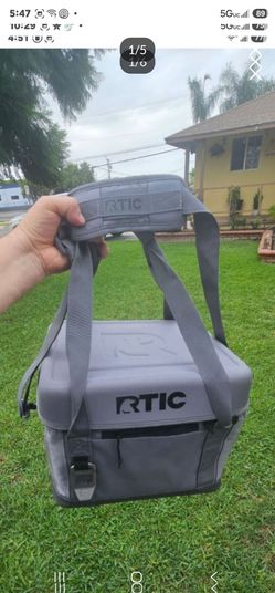 Rtic collapsed cooler bag with bottle opener