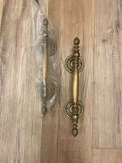 2 brass/gold door handle pulls