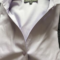 There Is Two Pieces A Skirt Size 10 A Color Is Navy Blue In The Blouse Size 12. The Color Is Light Purple Both For $25.total