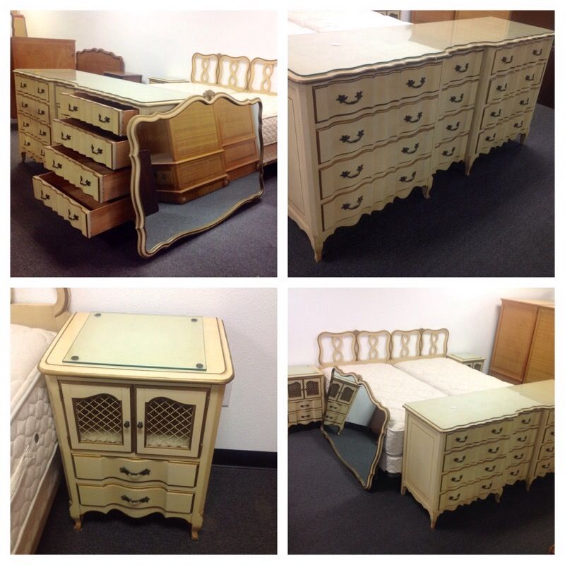 French provincial antique bed set includes a complete King bed, dresser with 12 drawers and mirror and two unique night stands
