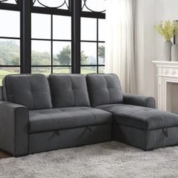 50% SALE 2 piece reversible sectional with storage and sleeper 