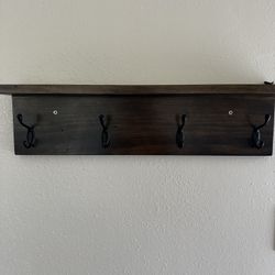 Wall shelf with hooks