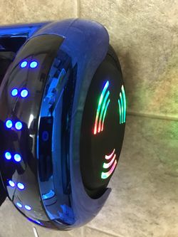 Brand new metallic blue hoverboard ( has Bluetooth and colorful led wheel lights)