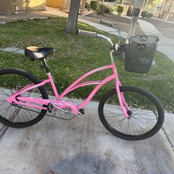 Pink girls bicycle